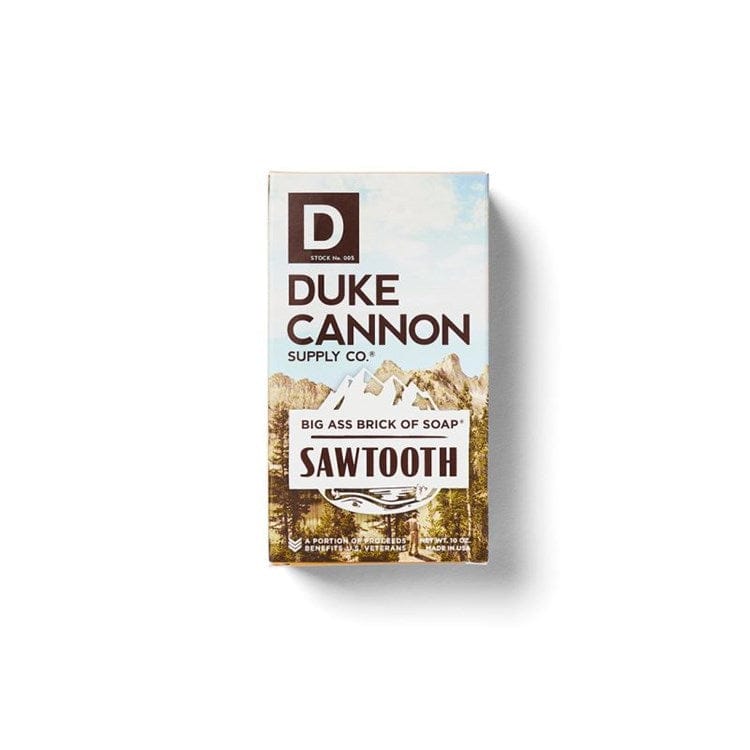 The soap is brown and has the Duke Cannon logo embossed on the front