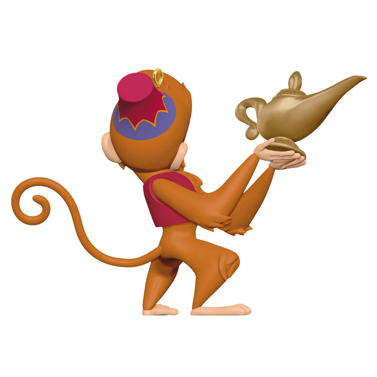 Abu the monkey from Disney’s Aladdin holding the magic lamp in a festive Christmas tree ornament