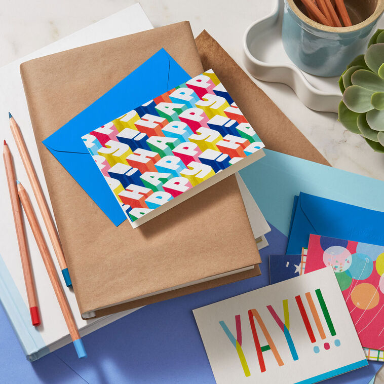 Hallmark blank note cards boxed set with colorful designs, rainbow lettering, stars, balloons, and cake, pack of 24