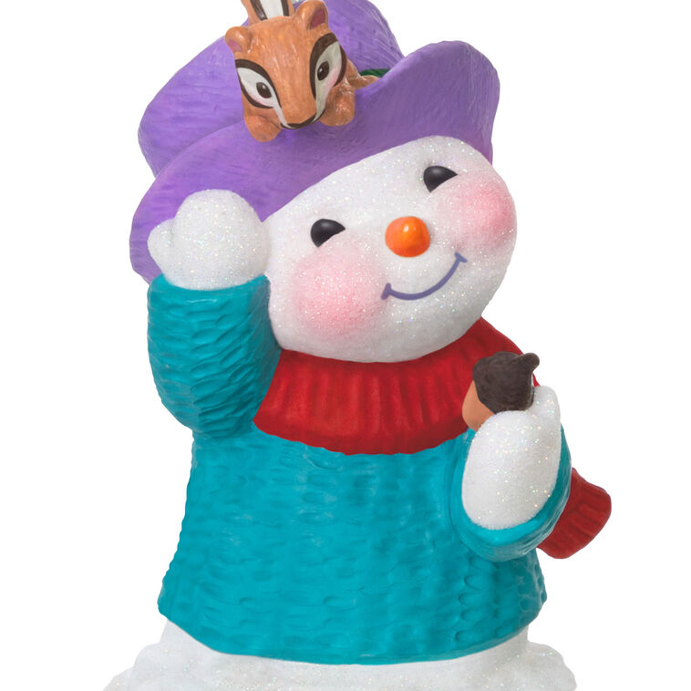 Snowman in blue sweater and red scarf, holding acorn with chipmunk on purple hat, Hallmark Keepsake Snow Buddies 2025 ornament