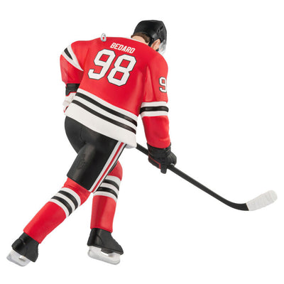 Connor Bedard ornament in Chicago Blackhawks jersey, number 98, action hockey pose, Hallmark NHL Christmas collectible for hockey fans

