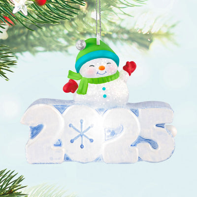 Glittery snowman in green hat and scarf atop snow-sculpted 2025, light-up mini Hallmark Christmas ornament, holiday collectible
