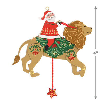Wooden pull-string ornament of Santa riding a lion with moving reins and legs, inspired by jumping jack toys