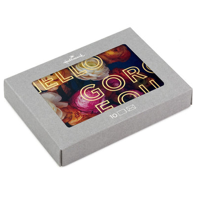 Blank note cards with vivid floral background and “HELLO GORGEOUS” gold foil lettering, boxed with envelopes.
