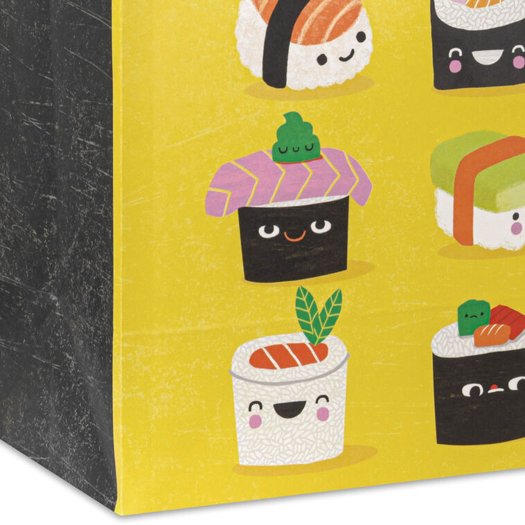 Hallmark medium gift bag with smiling sushi characters and pun text on a yellow background, perfect for fun gift occasions.