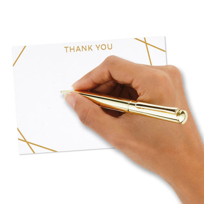 Flat white thank-you cards with intersecting gold foil lines and minimalist “thank you” message.
