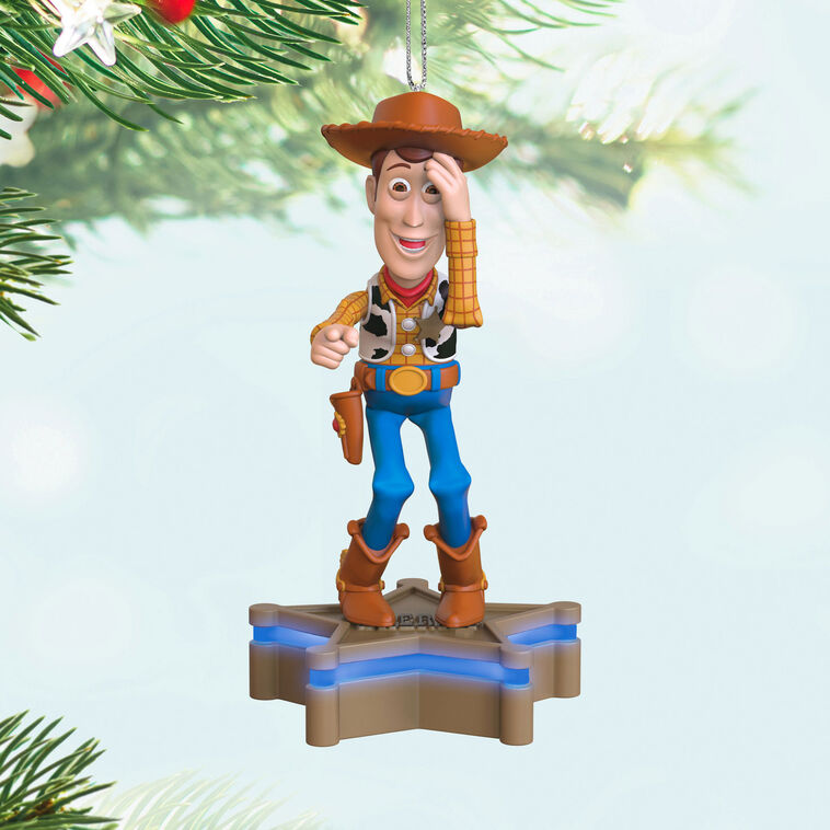 Hallmark Keepsake Toy Story Sheriff Woody ornament, cowboy figure with sound and light, Pixar Christmas tree decoration.