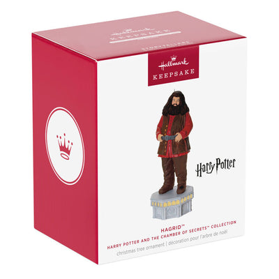 Hallmark Keepsake ornament of Hagrid from Harry Potter, standing on stone base with red coat, light and sound Chamber of Secrets Collection