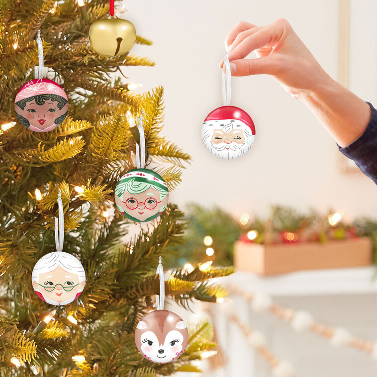 Set of 11 tin ball ornaments and gold jingle bell with North Pole Christmas characters, plus spiral-bound countdown book, Hallmark Keepsake
