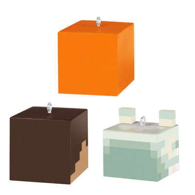 Set of three Minecraft mini ornaments featuring Alex, Steve, and an arctic fox heads in pixelated cube style with dimensional ears.