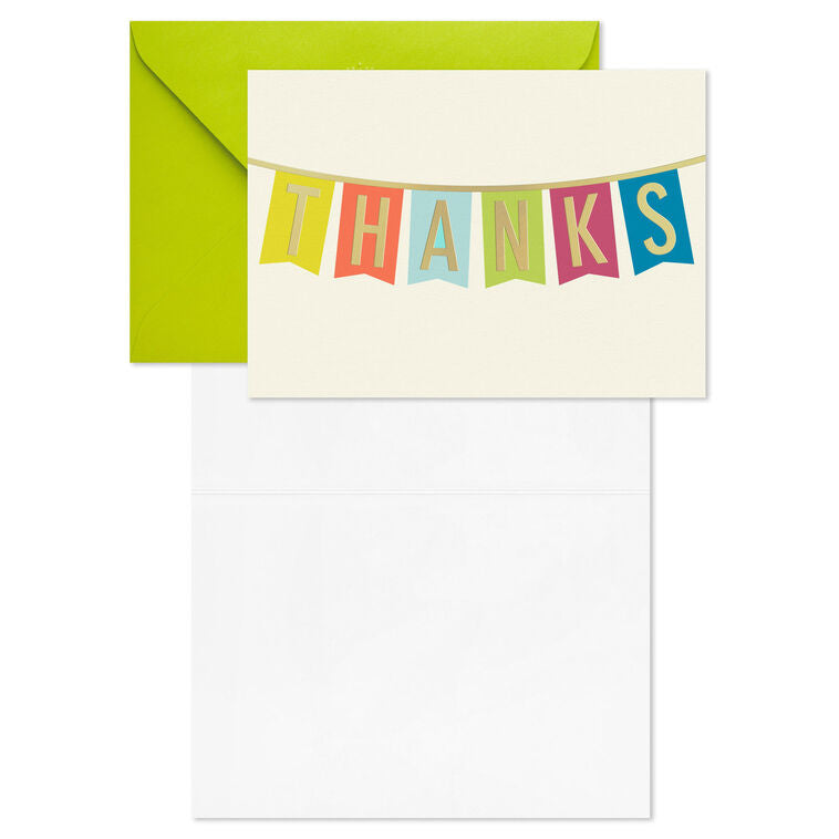 Thank-you cards with colorful pennant banner letters and gold foil on an off-white background.

