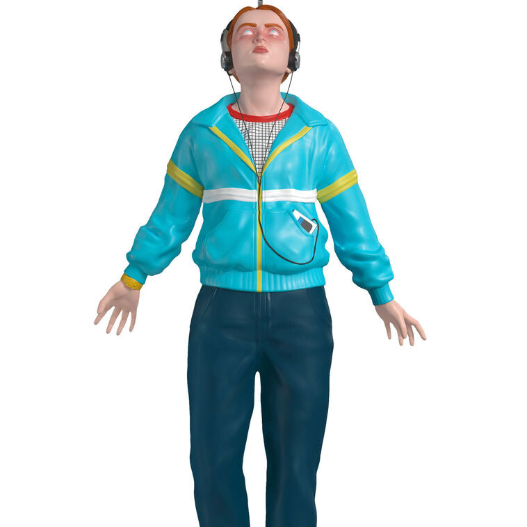 Max Mayfield ornament in blue and yellow windbreaker, levitating with headphones, inspired by Stranger Things TV series.
