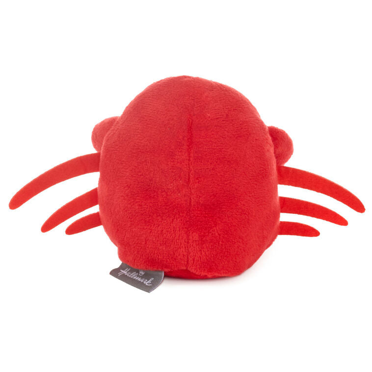 Smiling red plush crab with wire claws holding a gift card, perfect for fun gift presentation.
