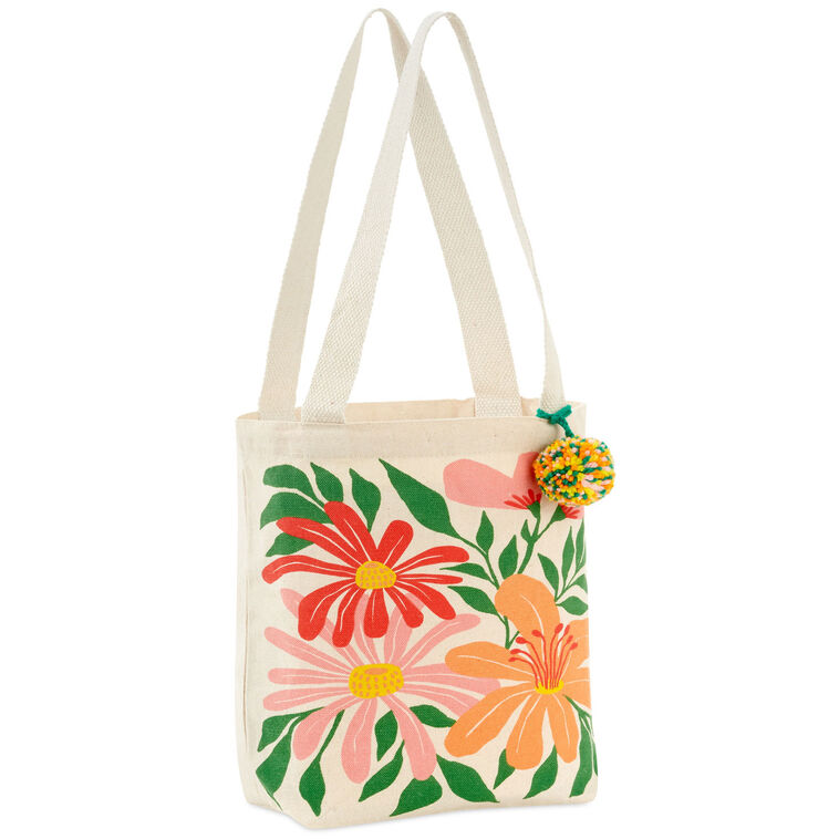 Hallmark 10.5-inch wildflowers fabric gift bag with retro floral design and pom-pom
