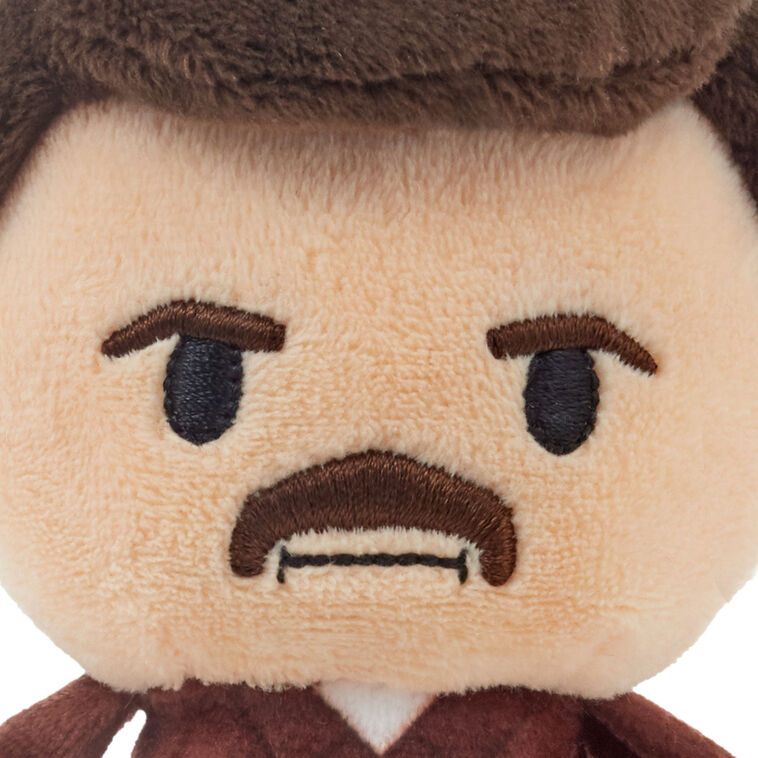 Ron Swanson plush with iconic mustache, checked shirt, and serious expression from NBC’s Parks and Recreation.

