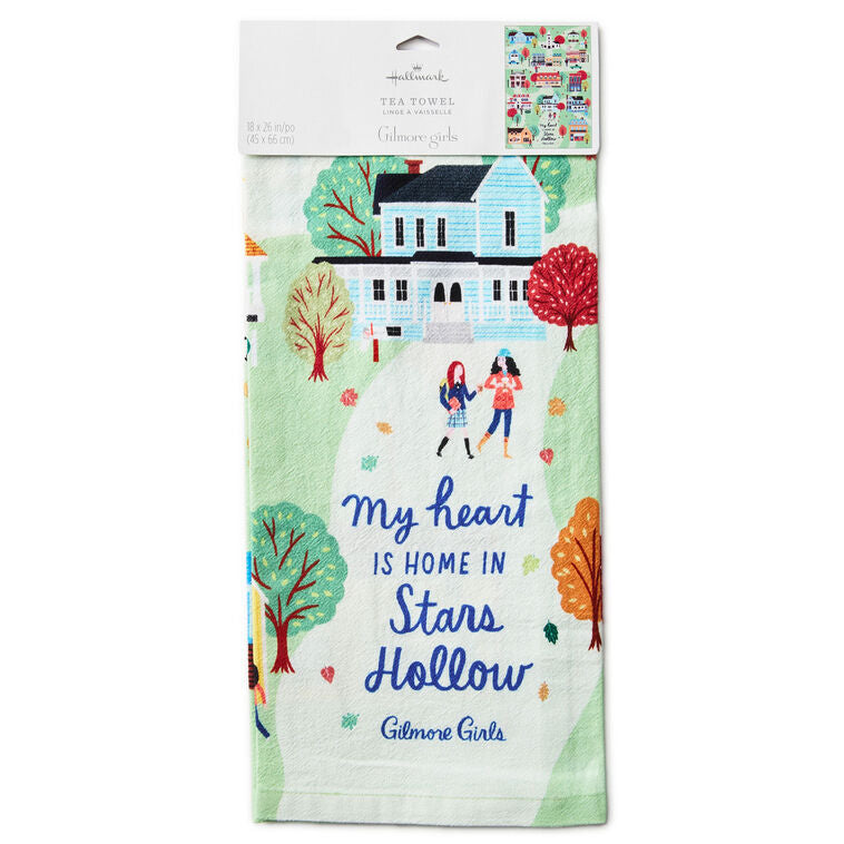 White tea towel printed with a whimsical Stars Hollow map and a central Gilmore Girls quote, includes a loop for hanging.
