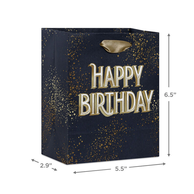Small Hallmark gift bag with “Happy Birthday” in bold white and gold foil lettering on a navy blue background with gold splatter detail.