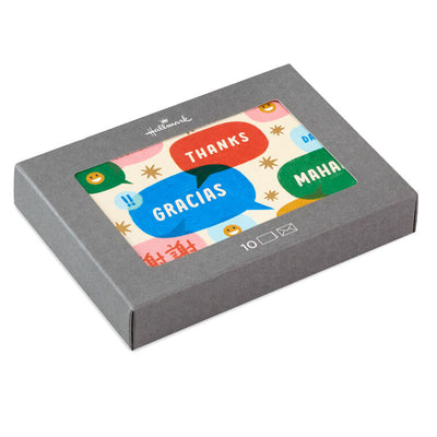 Multilingual thank you cards with colorful word bubbles and gold star foil accents, includes 10 blank notes and light blue-lined envelopes