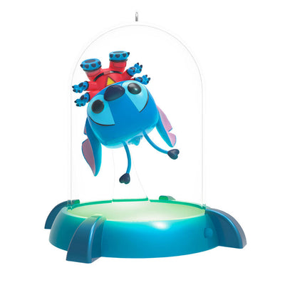 Lilo & Stitch Experiment 626 Funko POP! ornament trapped in prison capsule with light-up base, Disney keepsake.

