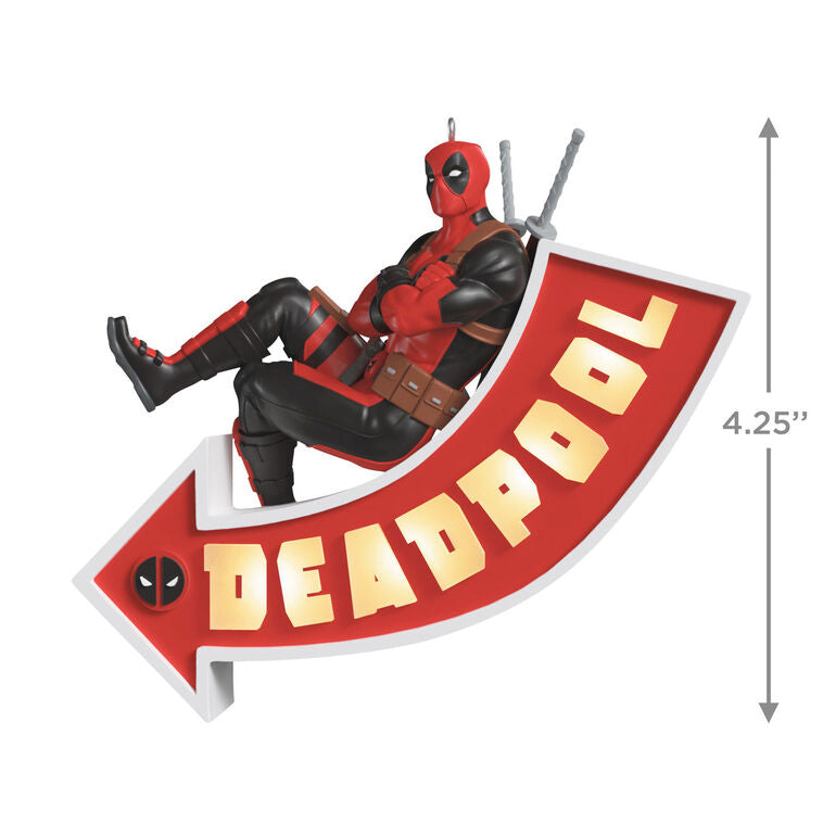 Deadpool ornament, Marvel character in red and black suit, arrow sign marquee, Hallmark Keepsake, Christmas decoration, light-up feature.