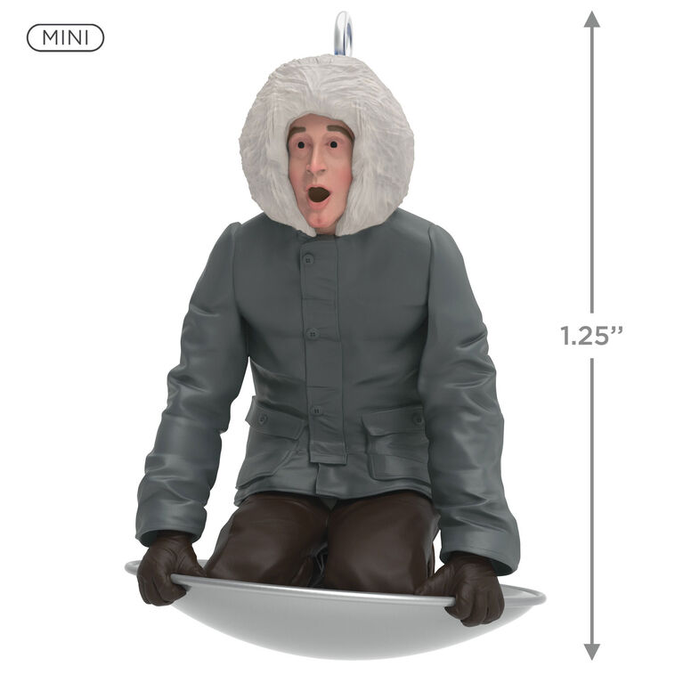 Hallmark Keepsake Mini National Lampoon’s Christmas Vacation Sledding Clark ornament—Clark in parka on saucer sled, startled expression, snowy hill