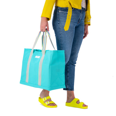 SCOUT Woven Tote Large Roadtripper in One in a Melon with striped breathable fabric and a sturdy, removable structured bottom.
