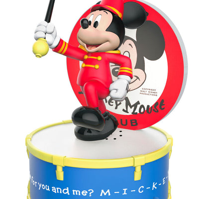 Mickey Mouse as bandleader in red outfit conducts with baton on drum stage in this musical Disney Christmas ornament with light.