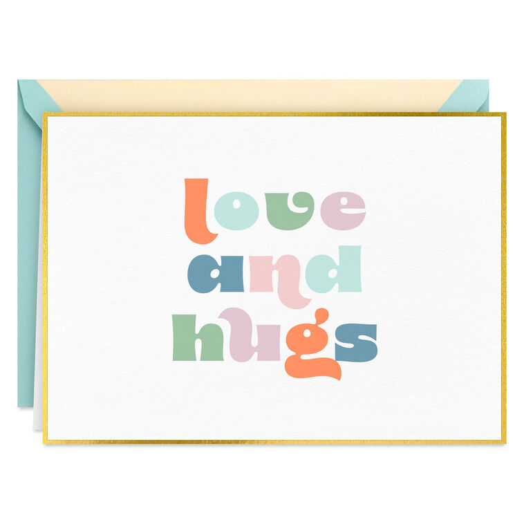 Pastel mod-style “Love and Hugs” blank note cards with gold foil frame on ivory paper, in kraft box.
