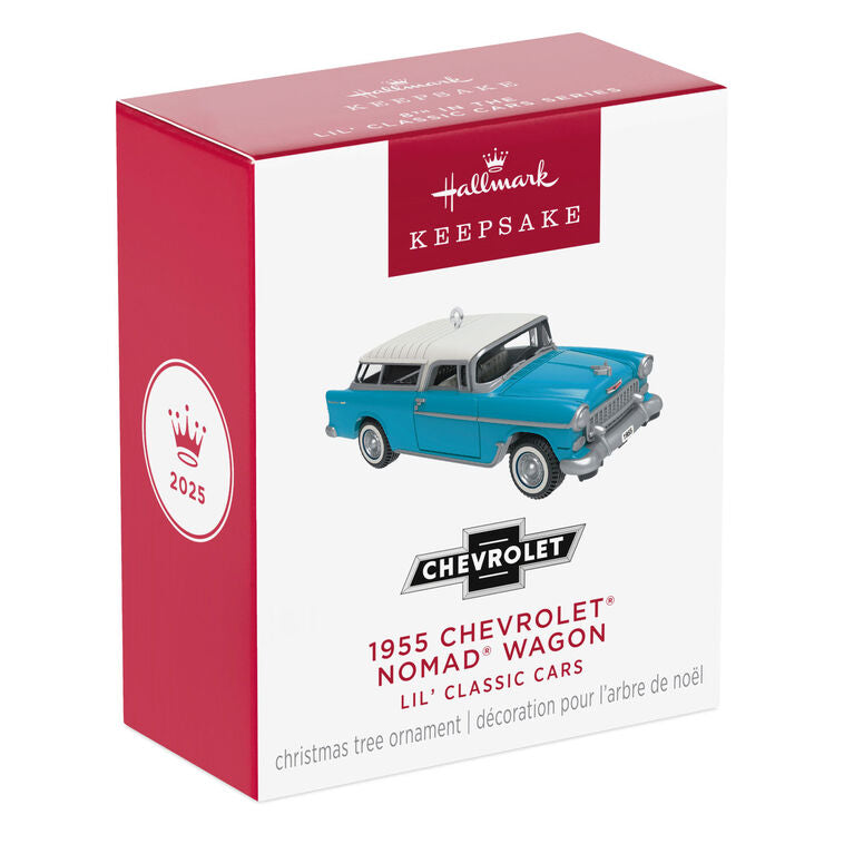 Miniature 1955 Chevrolet Nomad Wagon Christmas ornament in blue and white, featuring vintage styling, turning wheels, and silver accents.