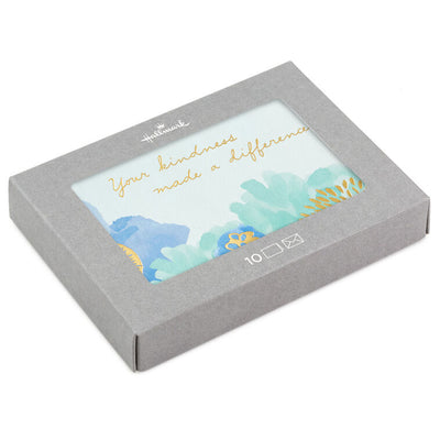 Blue and green floral watercolor thank-you cards with gold foil lettering, displayed in a gray gift box with matching white envelopes.