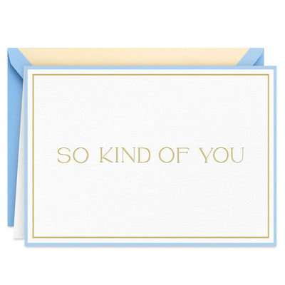 Elegant white thank-you cards with gold foil lettering, light blue border, and narrow gold frame.
