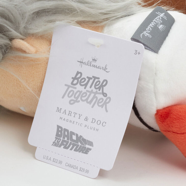 Back to the Future plush set of Doc Brown and Marty McFly with magnets, embroidered features, and movie-inspired outfits.
