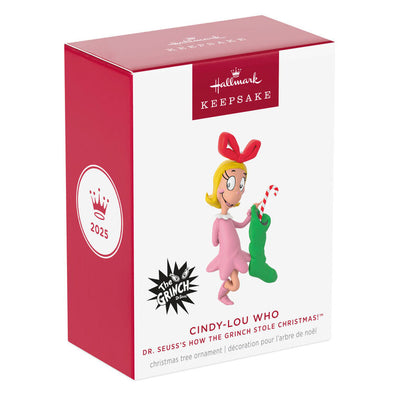 Hallmark Keepsake Dr. Seuss Cindy-Lou Who ornament, in pink nightgown, holding green stocking and candy cane, inspired by How the Grinch Stole Christmas.