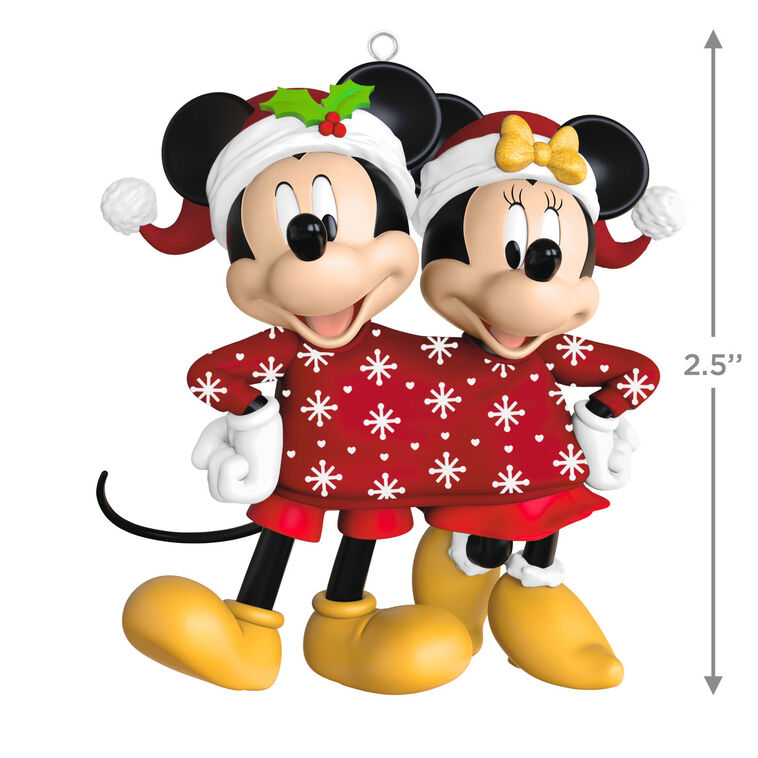 Mickey and Minnie wearing Santa hats and sharing a red Christmas sweater with snowflakes and hearts, Disney ornament.

