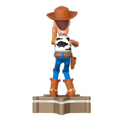 Hallmark Keepsake Toy Story Sheriff Woody ornament, cowboy figure with sound and light, Pixar Christmas tree decoration.