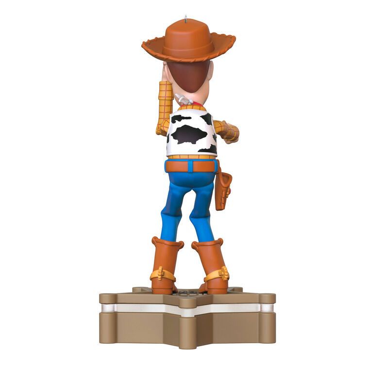 Hallmark Keepsake Toy Story Sheriff Woody ornament, cowboy figure with sound and light, Pixar Christmas tree decoration.