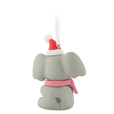 Gray elephant ornament in Santa hat and pink scarf holds a “Baby’s First Christmas 2025” ribbon.