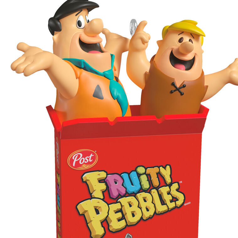 Hallmark Keepsake The Flintstones Fruity Pebbles ornament featuring Fred Flintstone and Barney Rubble in a red Fruity Pebbles cereal box.