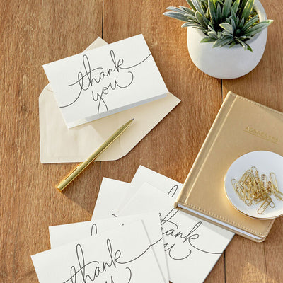 Ivory thank you cards with modern black script lettering and kraft box packaging, includes 40 blank cards and matching envelopes