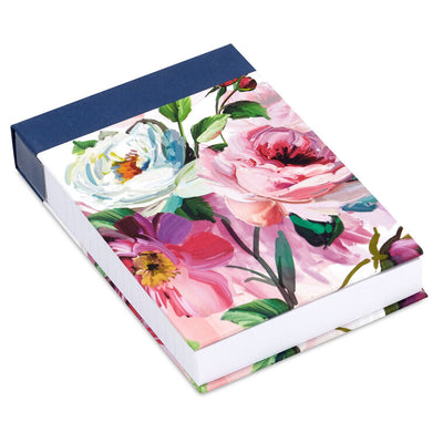 Small list pad with slate blue header and floral fabric cover featuring pink and white blossoms.