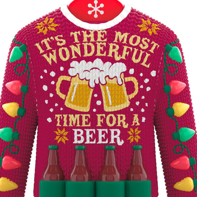 Red Christmas sweater ornament with beer mugs, bottles, and string lights design.

