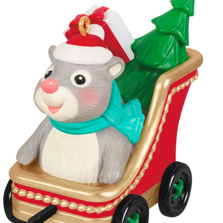 Hallmark Keepsake Cute as a Button ornament with a gray and white hamster in red sleigh, Santa hat, and Christmas tree.