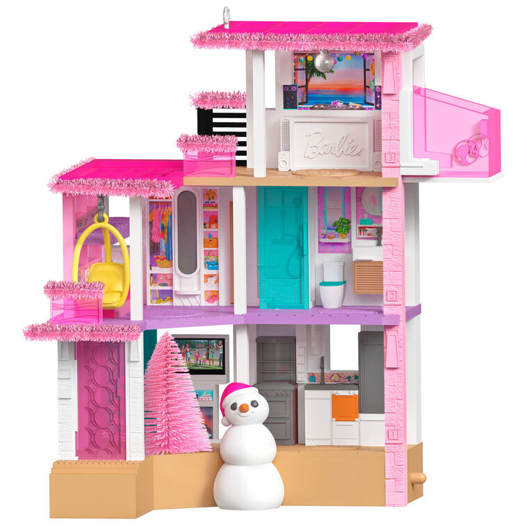Barbie Dreamhouse ornament, three-story pink house with rooftop studio, Christmas lights, and snowman, Hallmark Keepsake musical decoration.