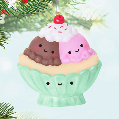 Miniature banana split ornament with chocolate and strawberry ice cream scoops, whipped cream, and cherry, Hallmark Keepsake
