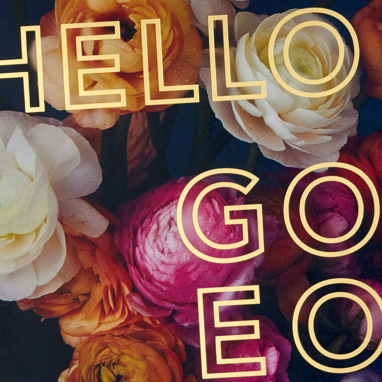 Blank note cards with vivid floral background and “HELLO GORGEOUS” gold foil lettering, boxed with envelopes.
