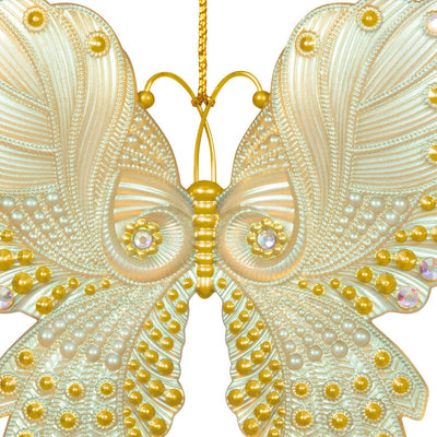 Brilliant Butterflies Christmas tree ornament with gold and pearlescent design, gem accents, and iridescent scalloped wings