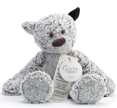 Large beige plush bear with a heart-shaped patch, soft fabric, 16 inches tall, ideal for giving as a heartfelt gift.