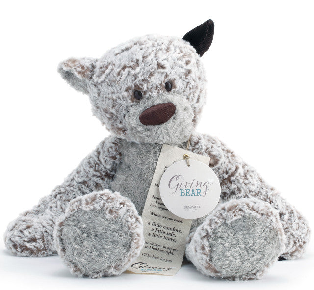 Large beige plush bear with a heart-shaped patch, soft fabric, 16 inches tall, ideal for giving as a heartfelt gift.