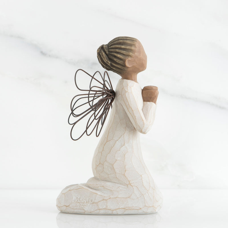 Angel of the Spirit figurine with darker skin tone, kneeling in prayer with wire wings and cream dress.