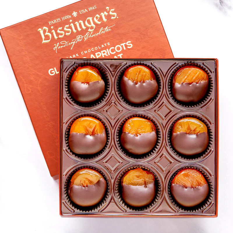 Gift box of 9 dark chocolate-dipped glaceed apricots made from California-grown fruit and 60% European dark chocolate.

